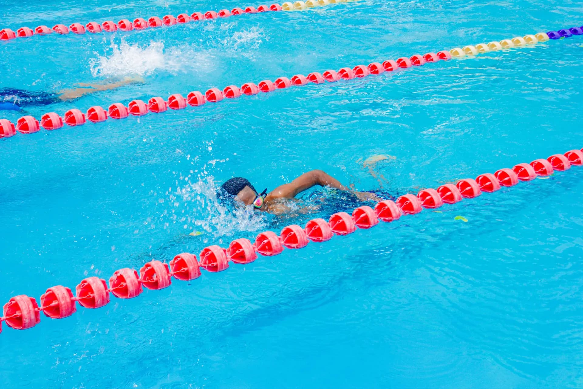 Milestones Academy pupils competing in a swimming race in 2026