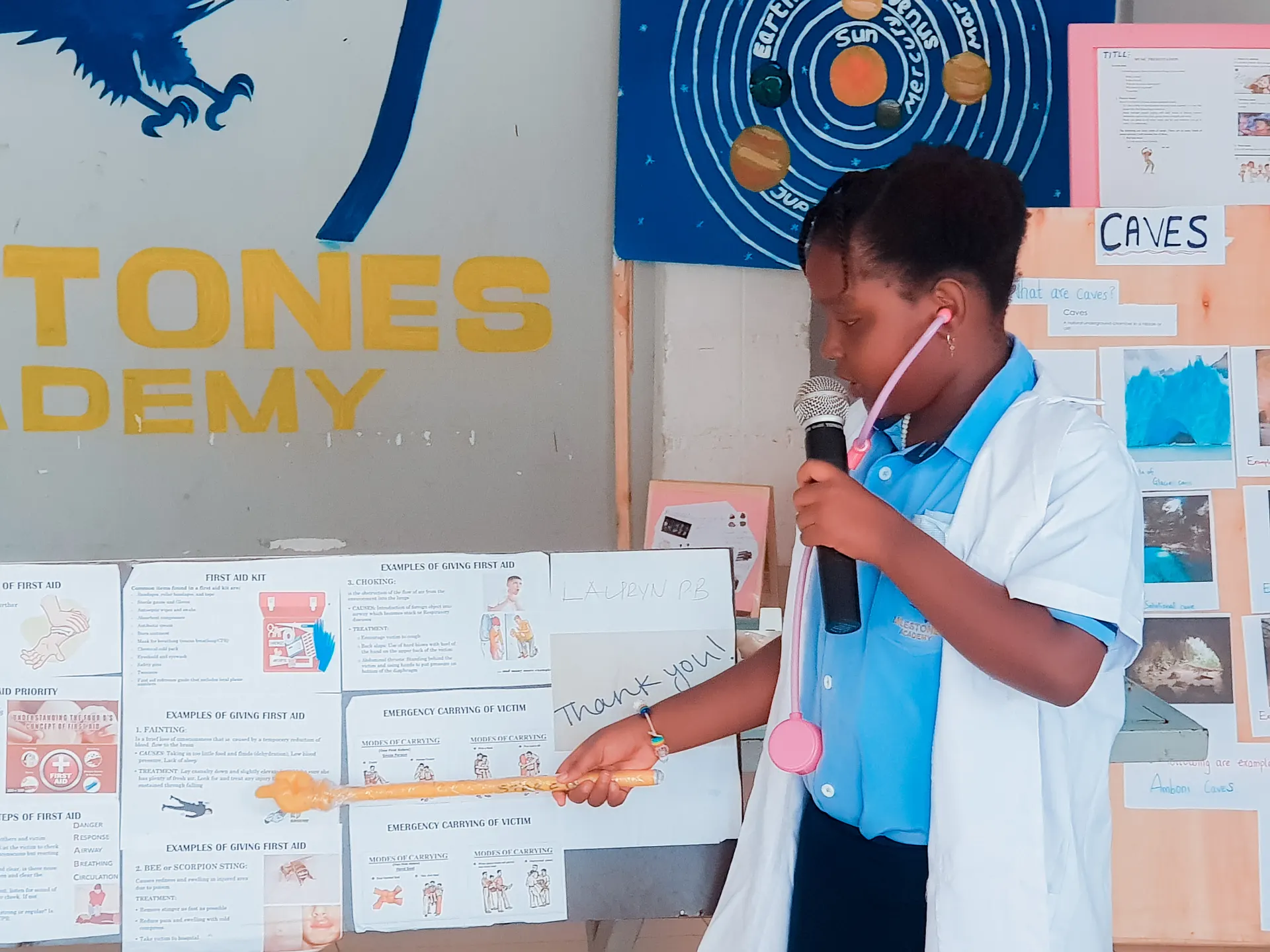 A learner presenting a first-aid project.