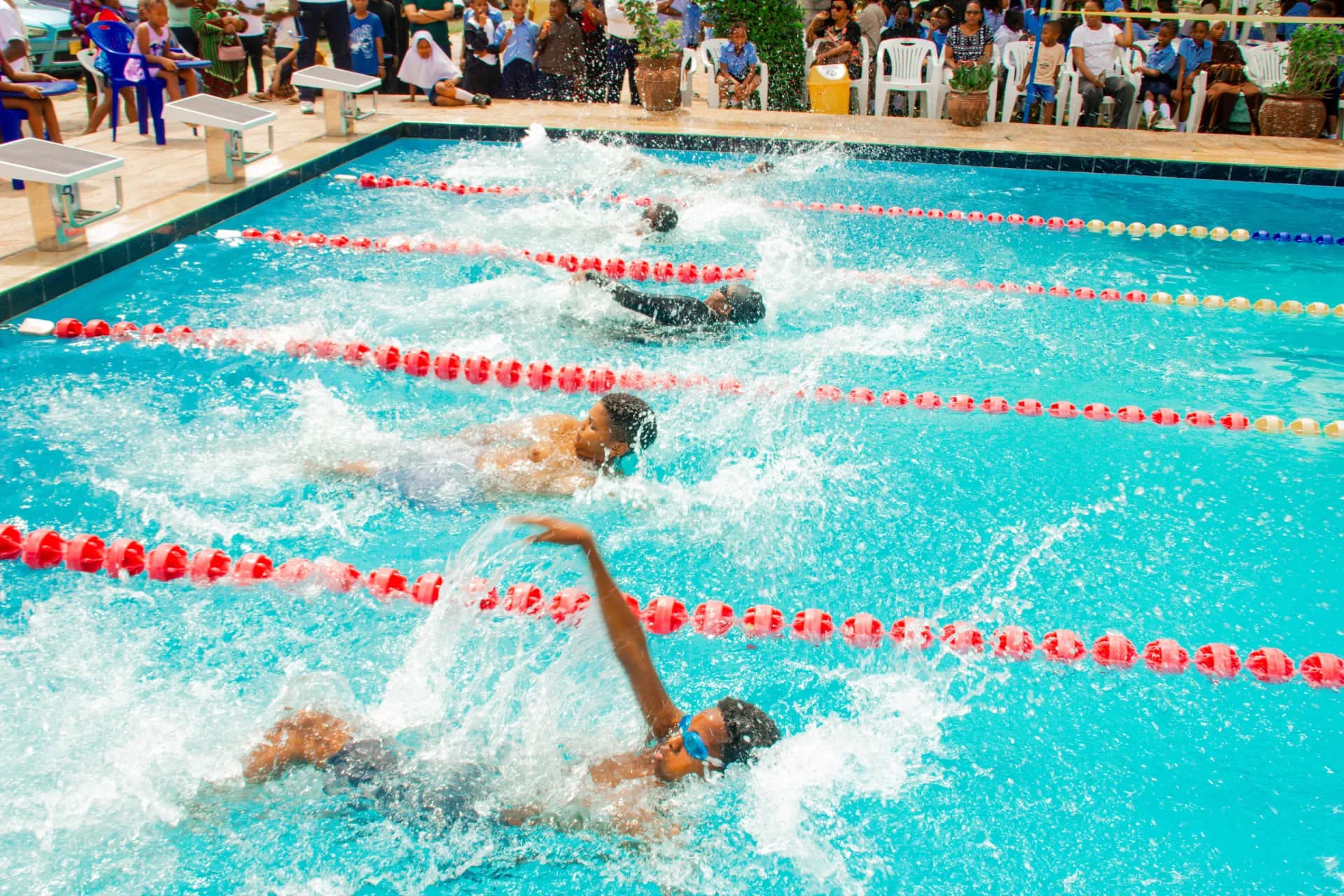 Swimming races in progress at Milestones Academy.
